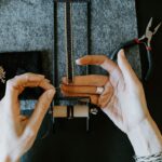 Jewellery artisan working on a contemporary piece in a studio workshop