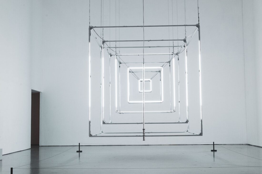 Geometric light installation displayed in a contemporary art gallery