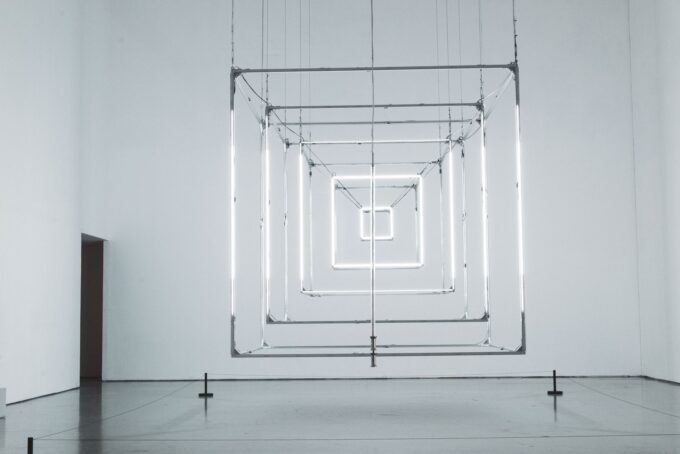 Geometric light installation displayed in a contemporary art gallery